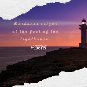 Darkness reigns at the foot of the lighthouse.