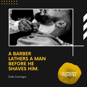 A barber lathers a man before he shaves him.